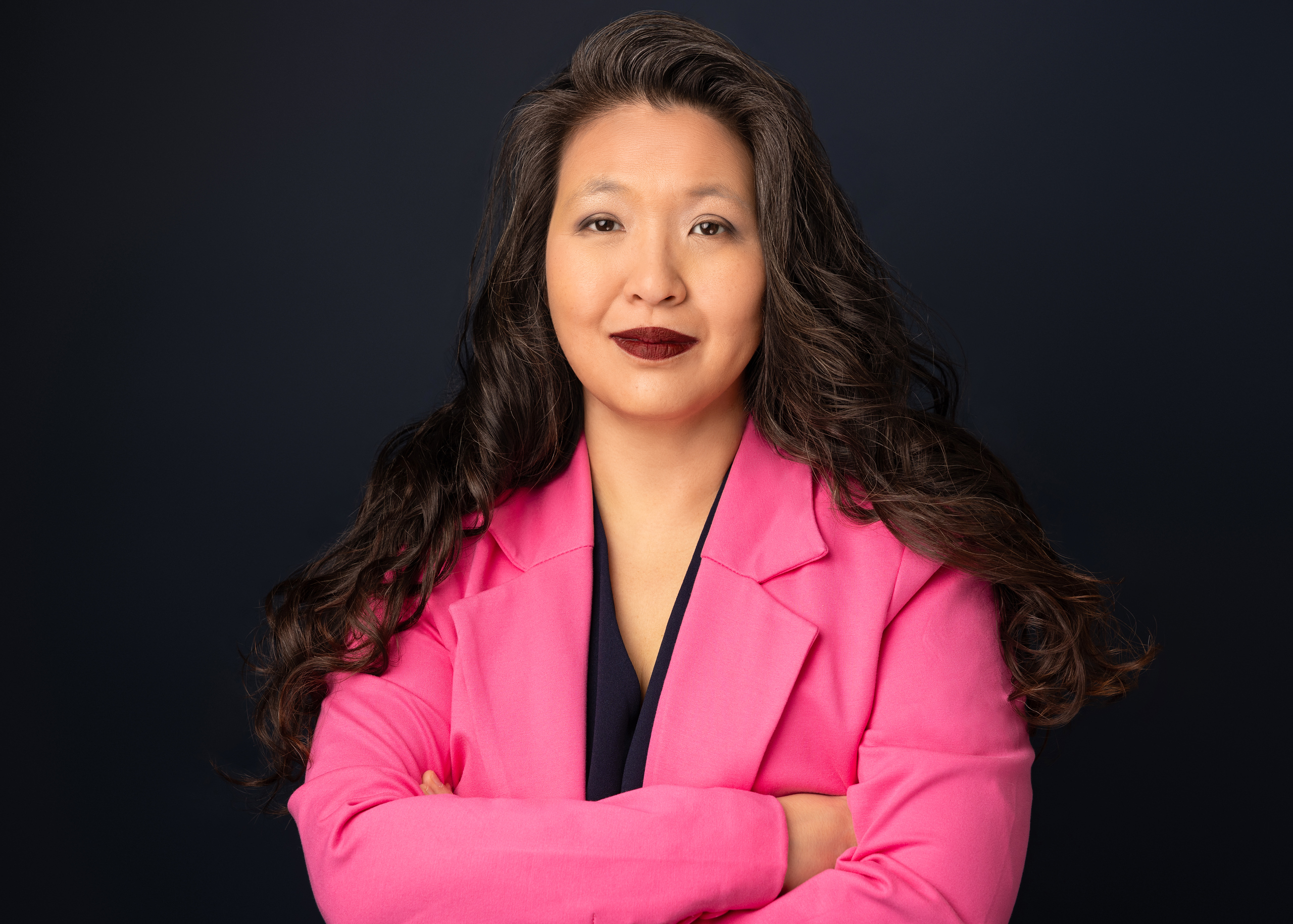 Dr. Lillian Liang Emlet in a pink blazer